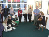 Annette Plays a Song for her Father Martin