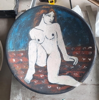 Pale Woman on Patterned Rug