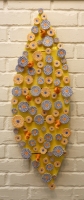 Yellow, blue, white and orange wall lozenge